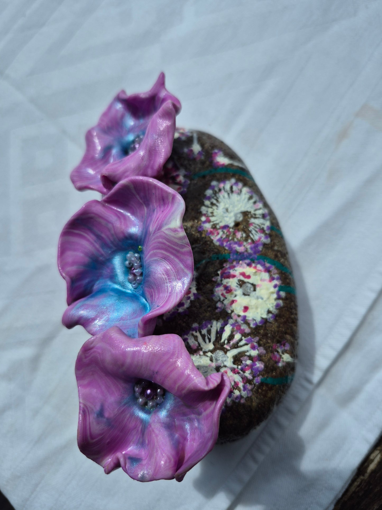A trio of flowerbee pot