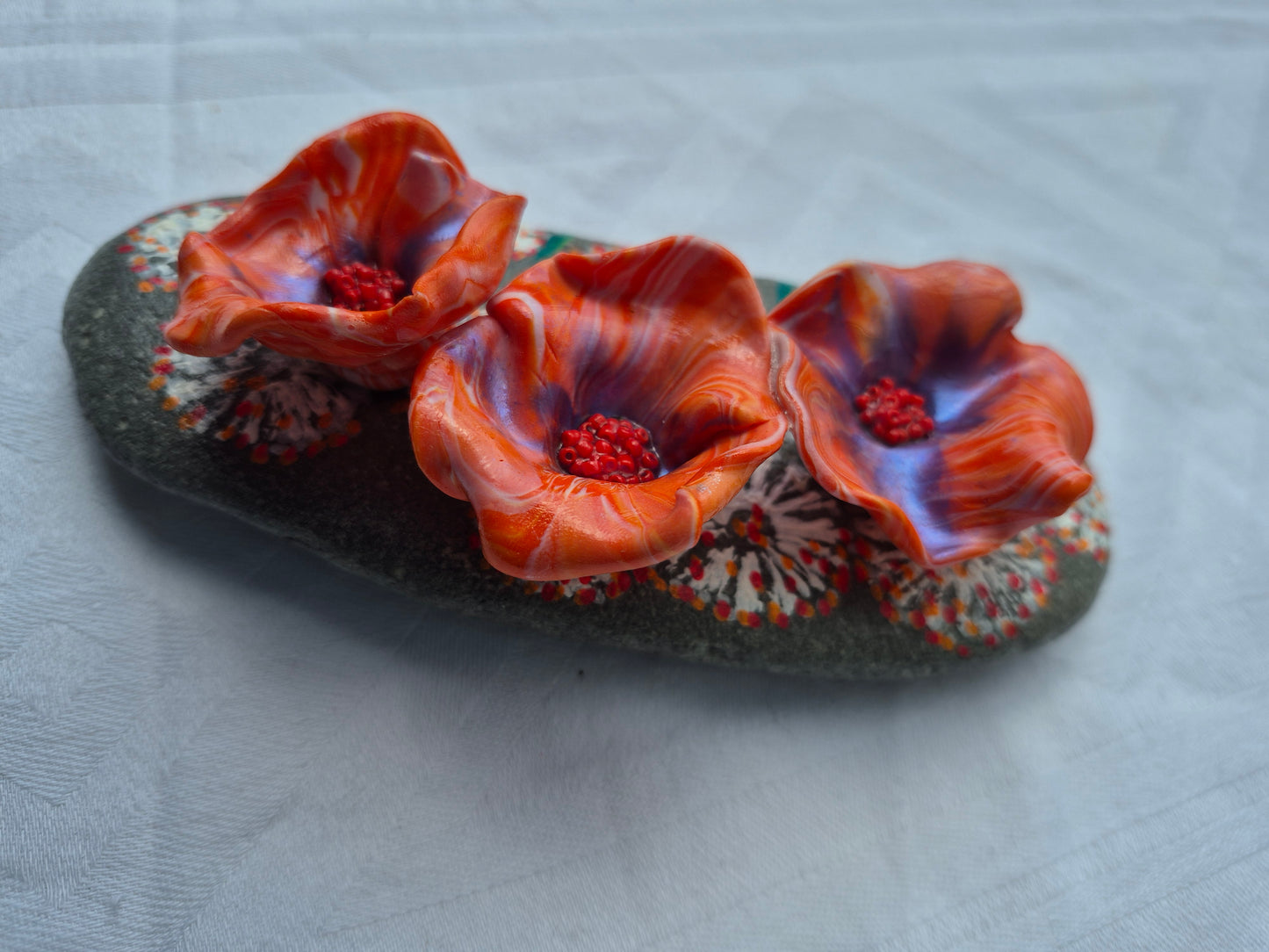 A trio of flowerbee cups.