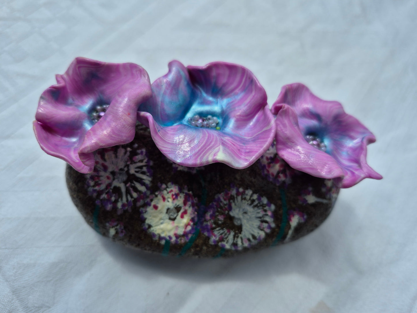 A trio of flowerbee pot